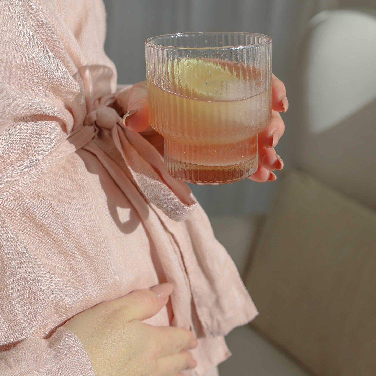 Pregnancy Women with a drink for nausea and dehydration in morning sickness